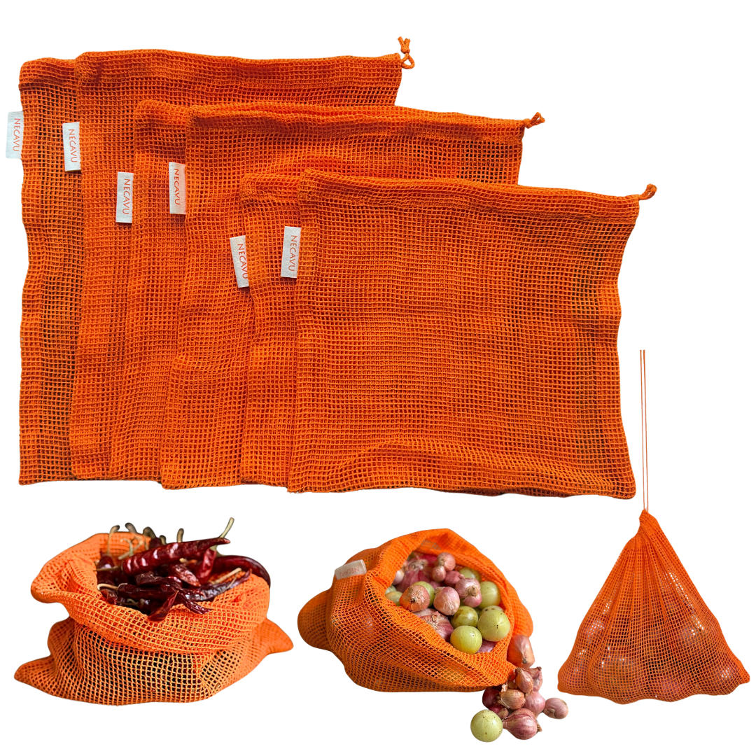 Set of orange mesh bags with vegetables and a net on a white background  PT-MSH-ORG