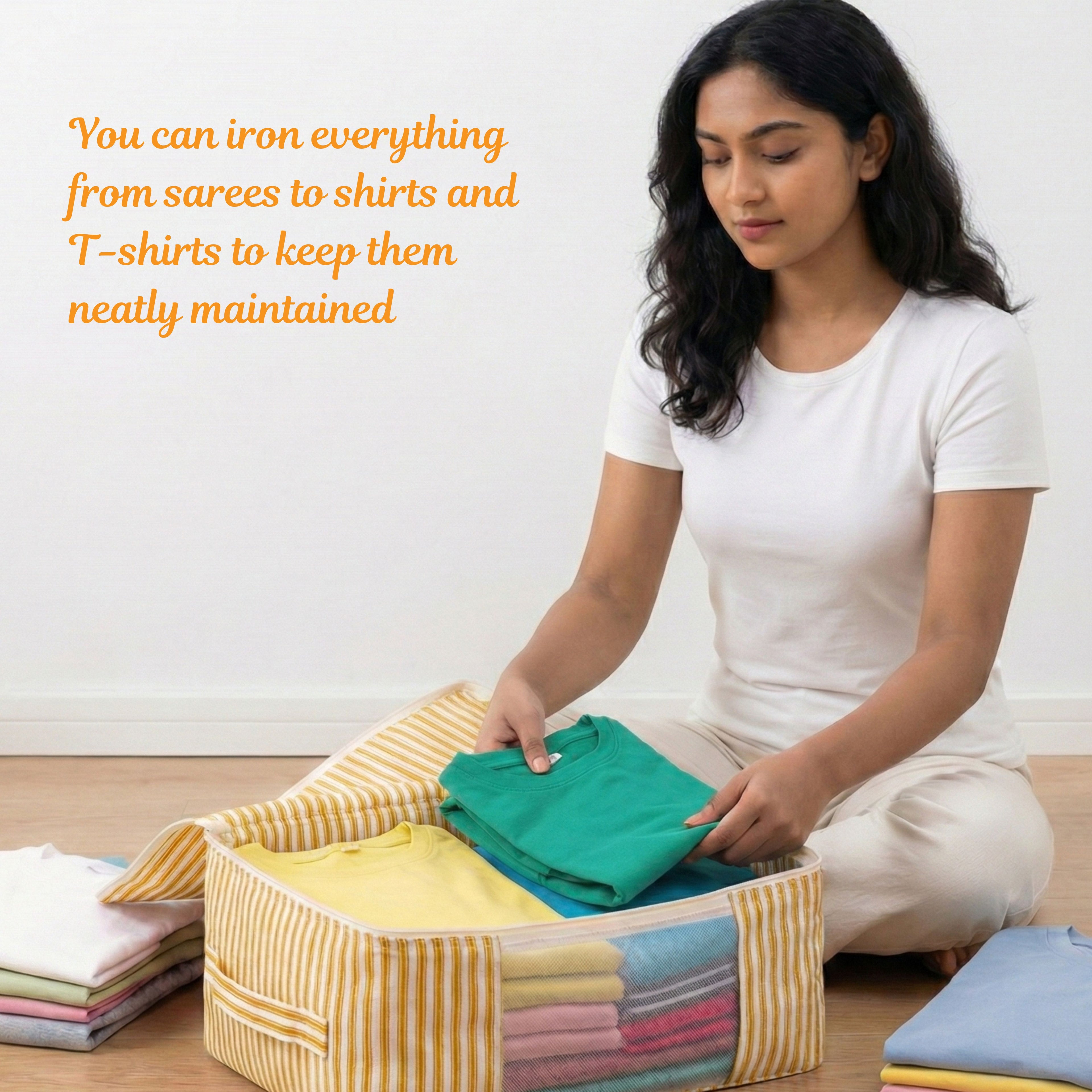 Woman folding clothes on a yellow striped saree organizer bags(NC-SRO-YLW)