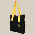 Side view of Black color cotton tote bag with sunflower embroidery (PT-TRO-YLW)