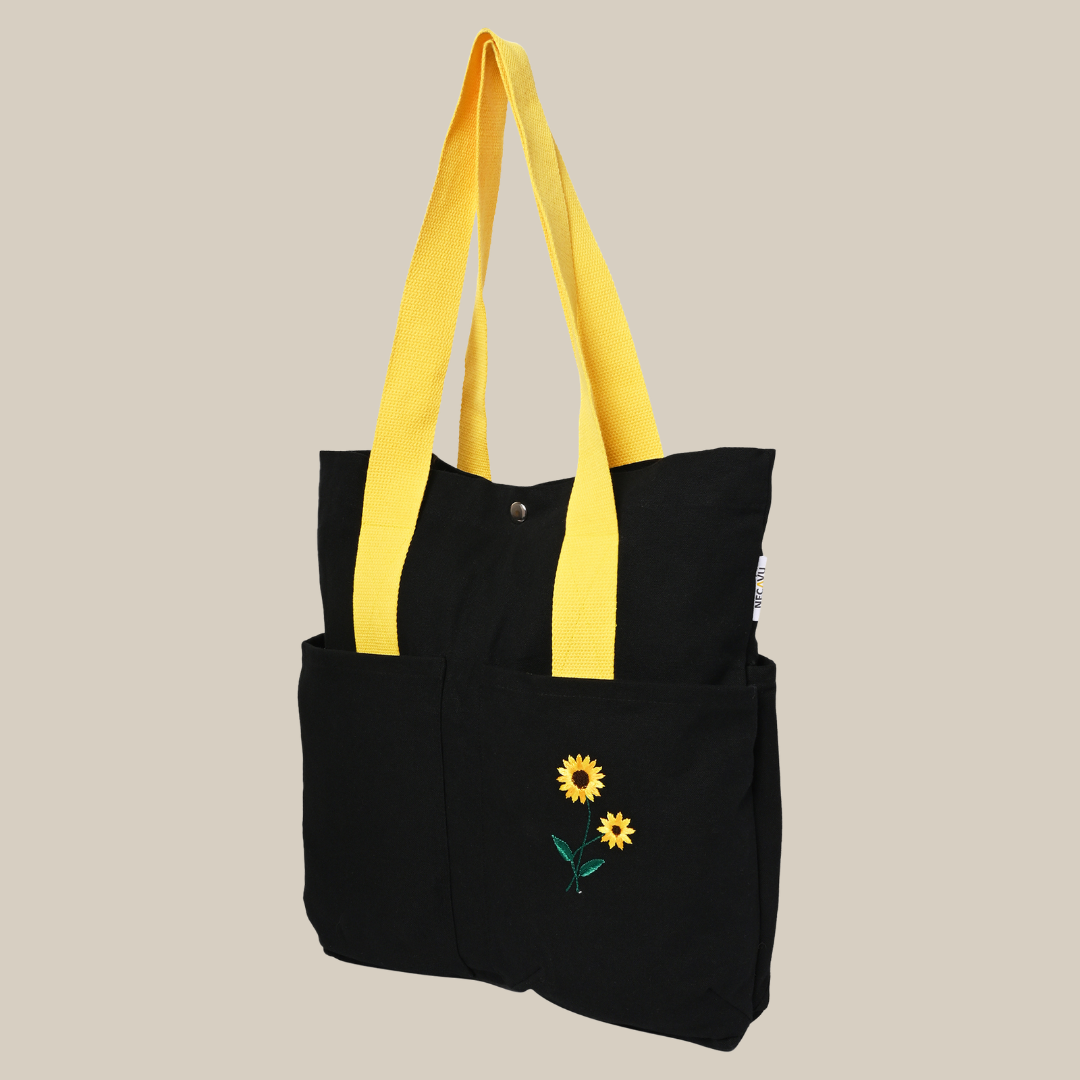 Side view of Black color cotton tote bag with sunflower embroidery (PT-TRO-YLW)