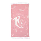 Pink towel with white fish design on a white background VU-YNG-RSE