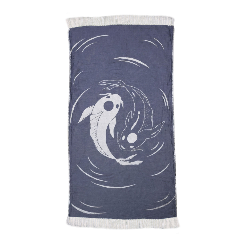 Navy blue towel with white koi fish design on a white background VU-YNG-IND