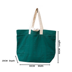 Green tote bag with white handles and dimensions labeled on a white background  NC-JMB-GRN