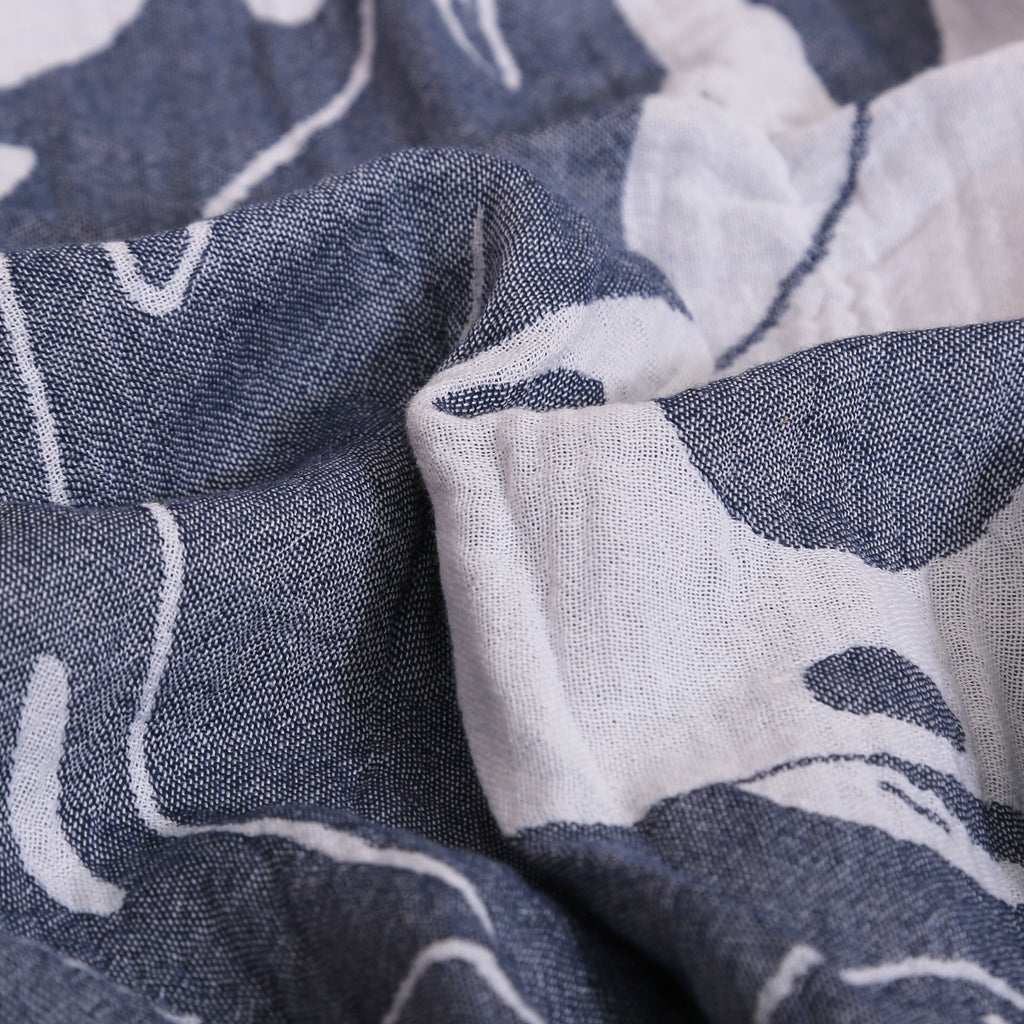 Close-up of blue and white patterned fabric VU-YNG-IND