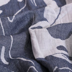 Close-up of blue and white patterned fabric VU-YNG-IND