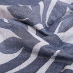 Close-up of blue and white patterned fabric VU-MND-MNT