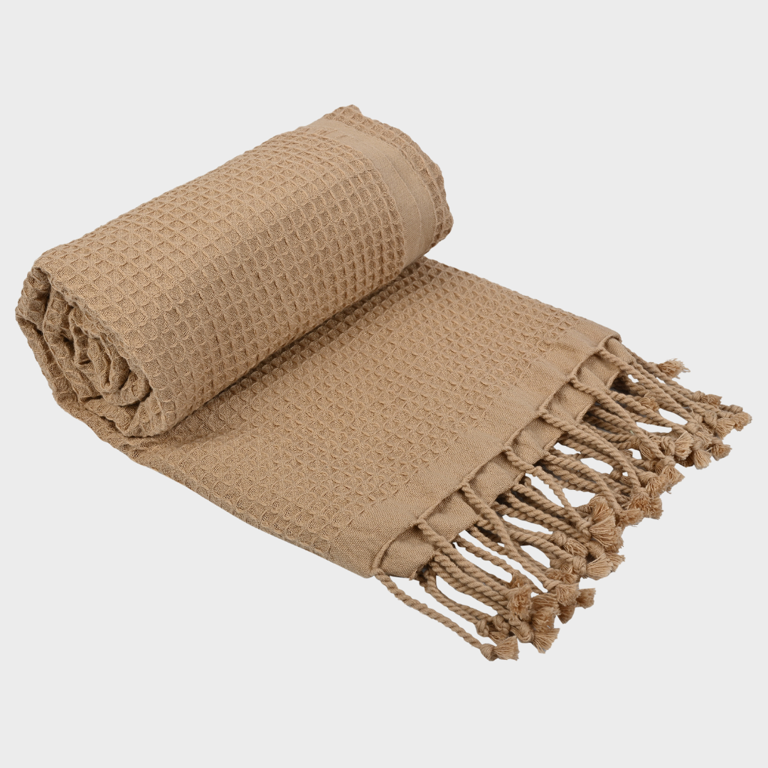 Beige waffle towel on plain background (PT-WFL-BIS)