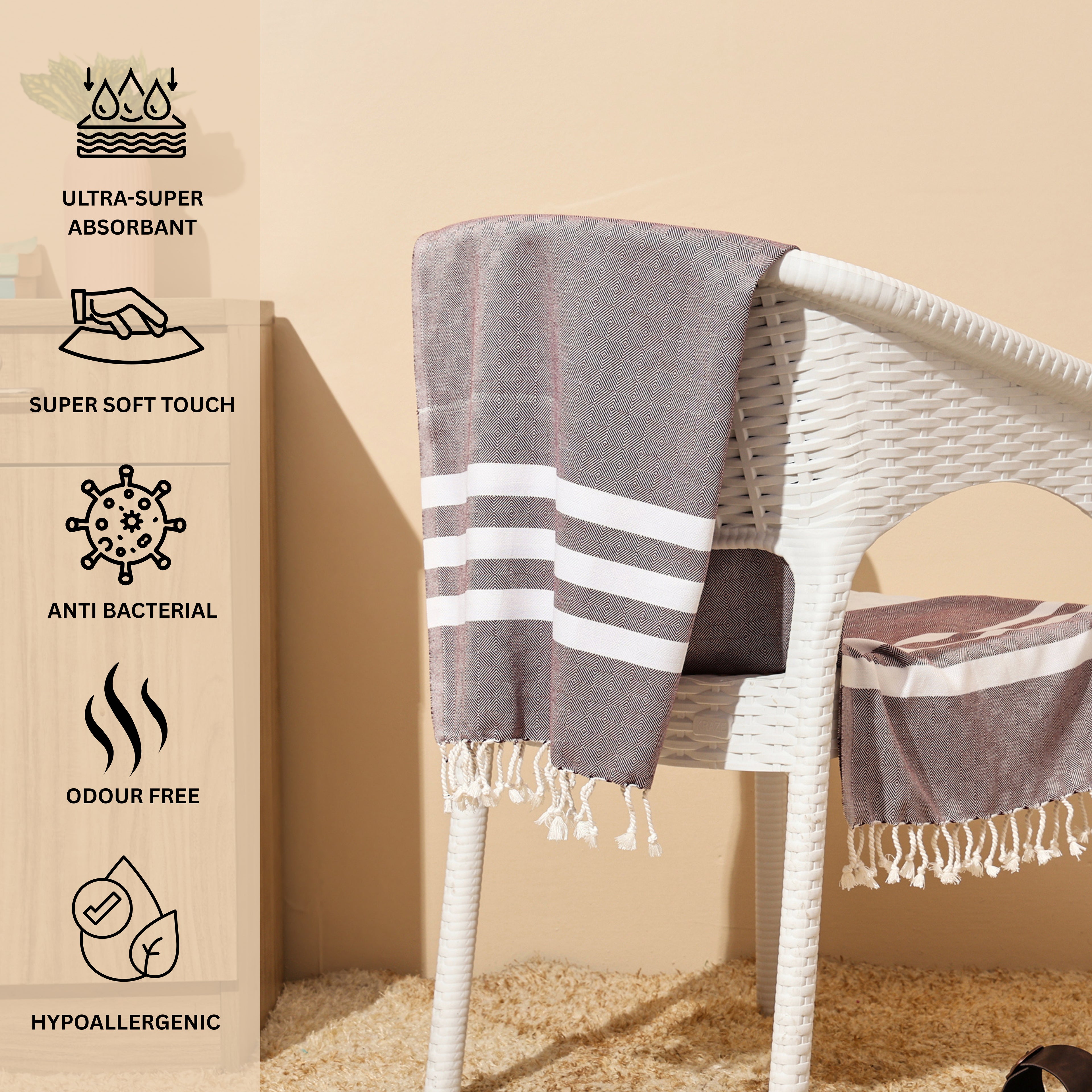 Burgundy bamboo towel draped over a chair on a beige background with product features listed.(PT-BMB-BRG)