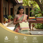 Woman holding a cream  Saree bag in an outdoor setting with text icons about fabric properties. (NC-SRZ-OWT)