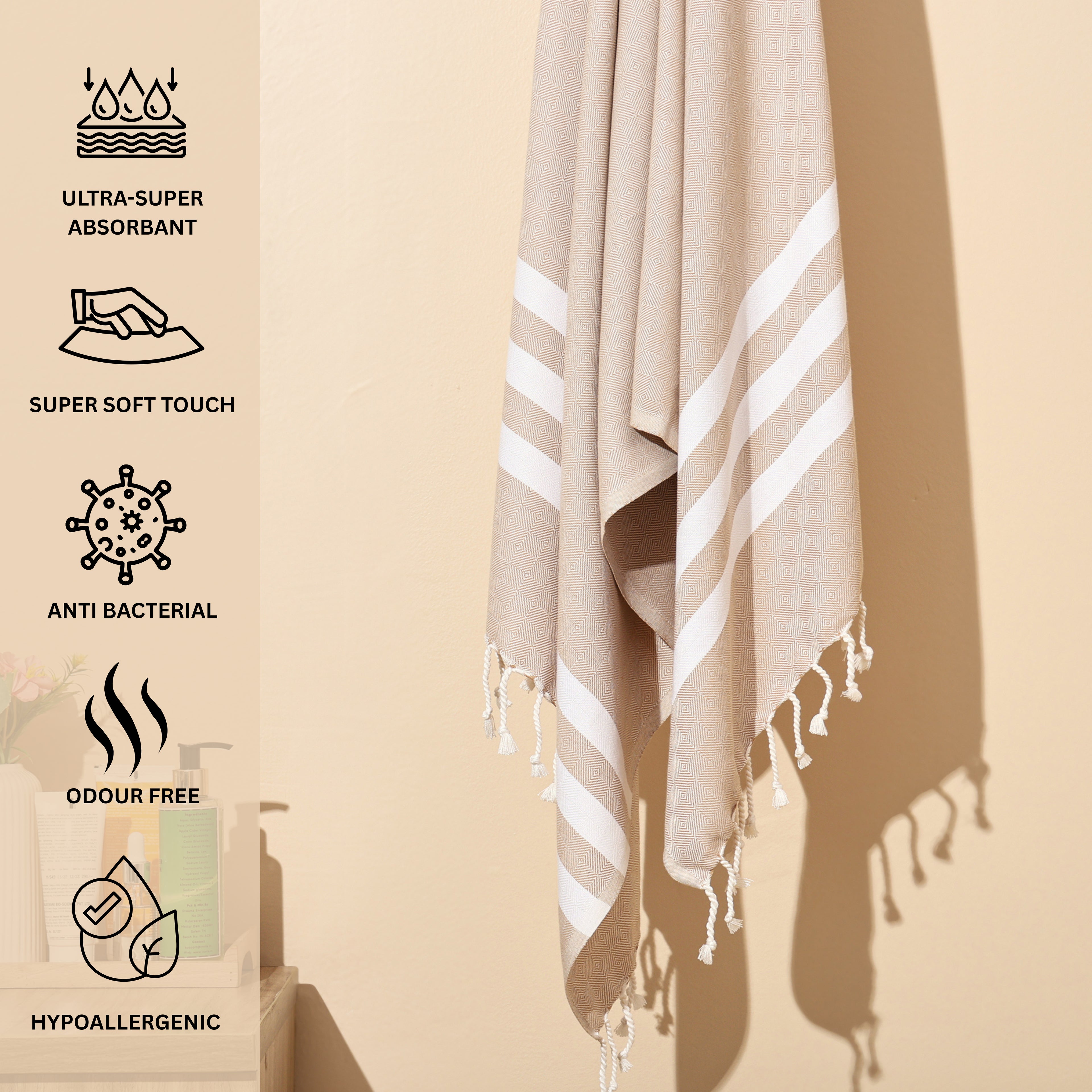 Beige towel with white stripes and tassels on a beige background, featuring product attributes.(PT-BMB-TPE)